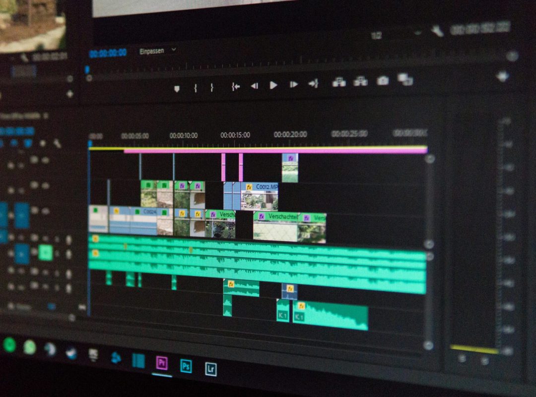 Close-up of a video editing timeline interface on a computer screen, showcasing professional software in action.